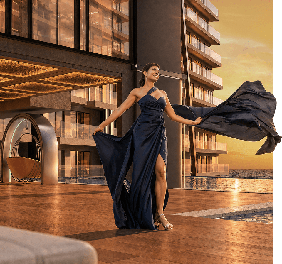 Woman in a navy evening gown walks by a pool at sunset, fabric billowing as she twirls on a modern terrace.